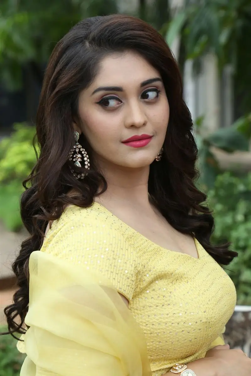 TELUGU GIRL SURBHI PURANIK PHOTOSHOOT IN YELLOW GOWN 9